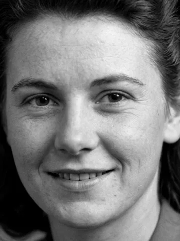 After: the same face repaired, identity unchanged