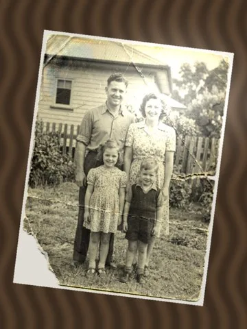 Before: an old print photographed at an angle on a table, with glare