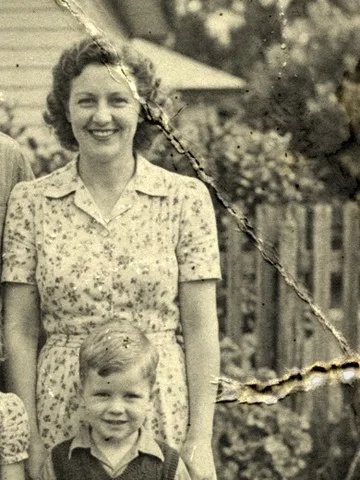 Before: a torn, creased family photograph